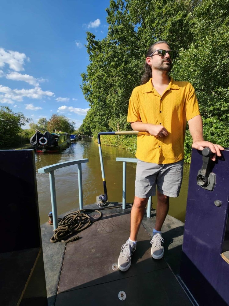 Traditionally painted narrowboat stern in the sunshine